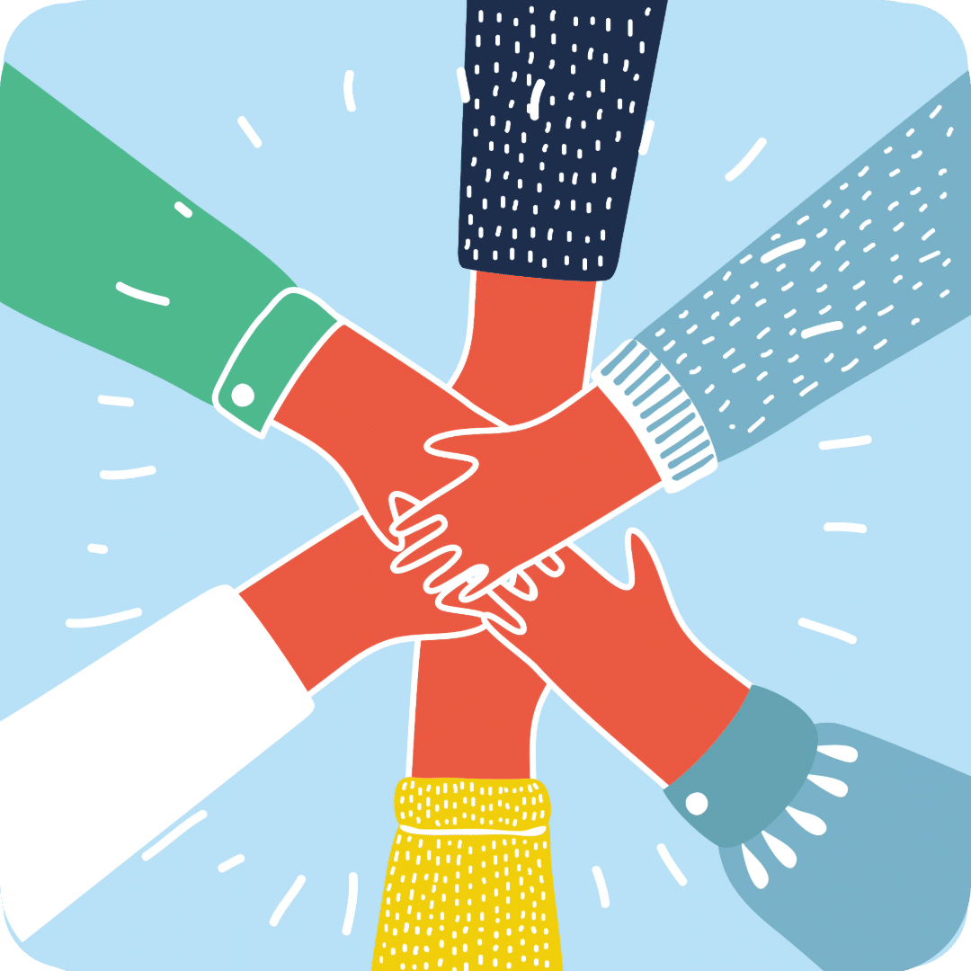 Four people stacking their hands together in a symbol of teamwork.